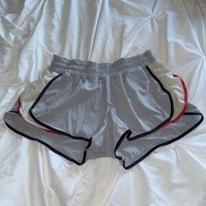 Woman’s Light Grey Size 4 Lululemon Shorts with Red and Black Strips